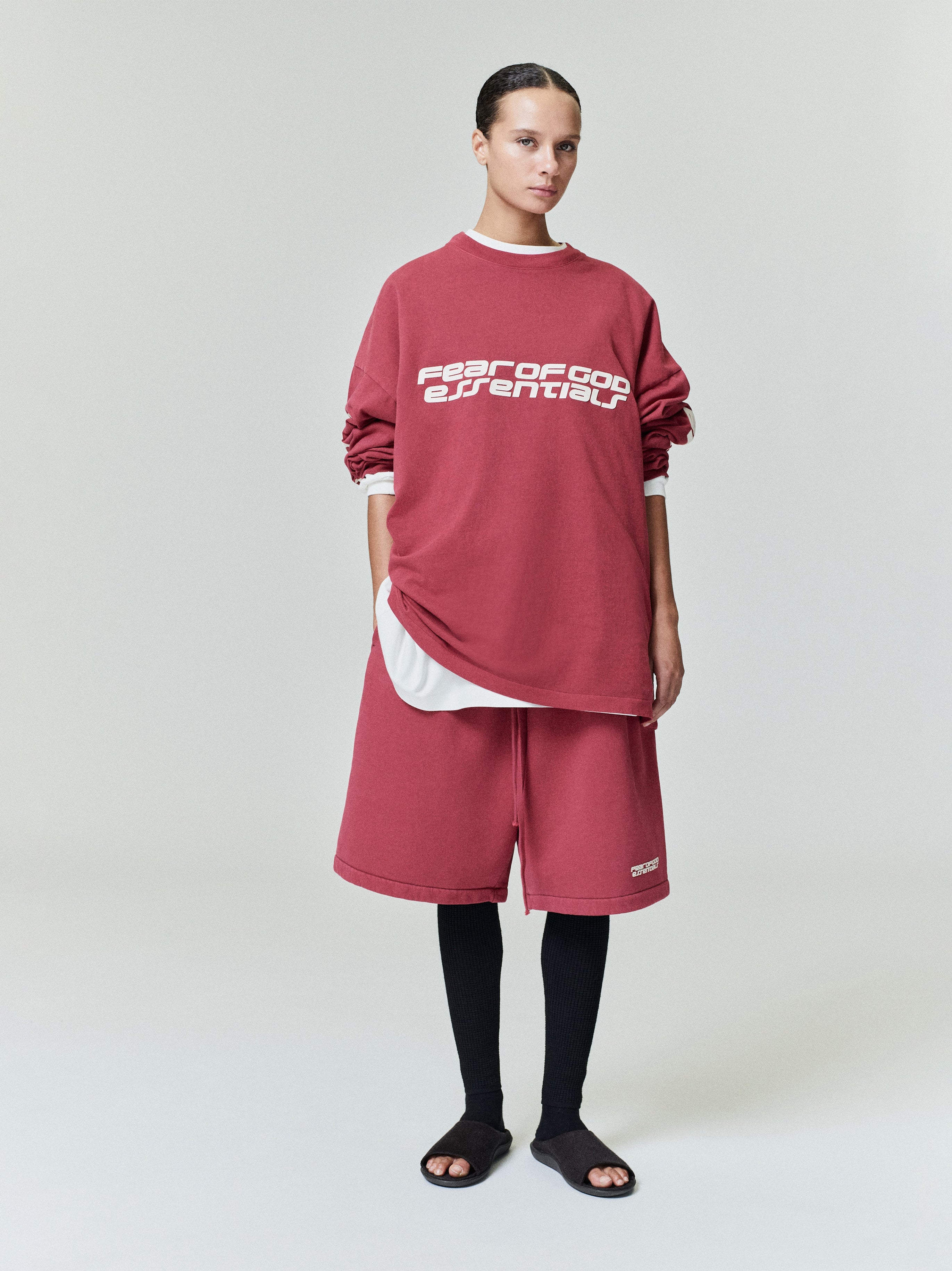 Full front view of model in canyon-colored 90s Long Sleeve Tee with oversized fit, paired with matching shorts, gallery 0.