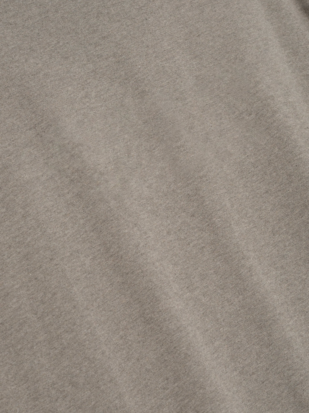 close-up of taupe medium-weight cotton jersey fabric with soft texture from Essentials SS26 Classic Long Sleeve Tee