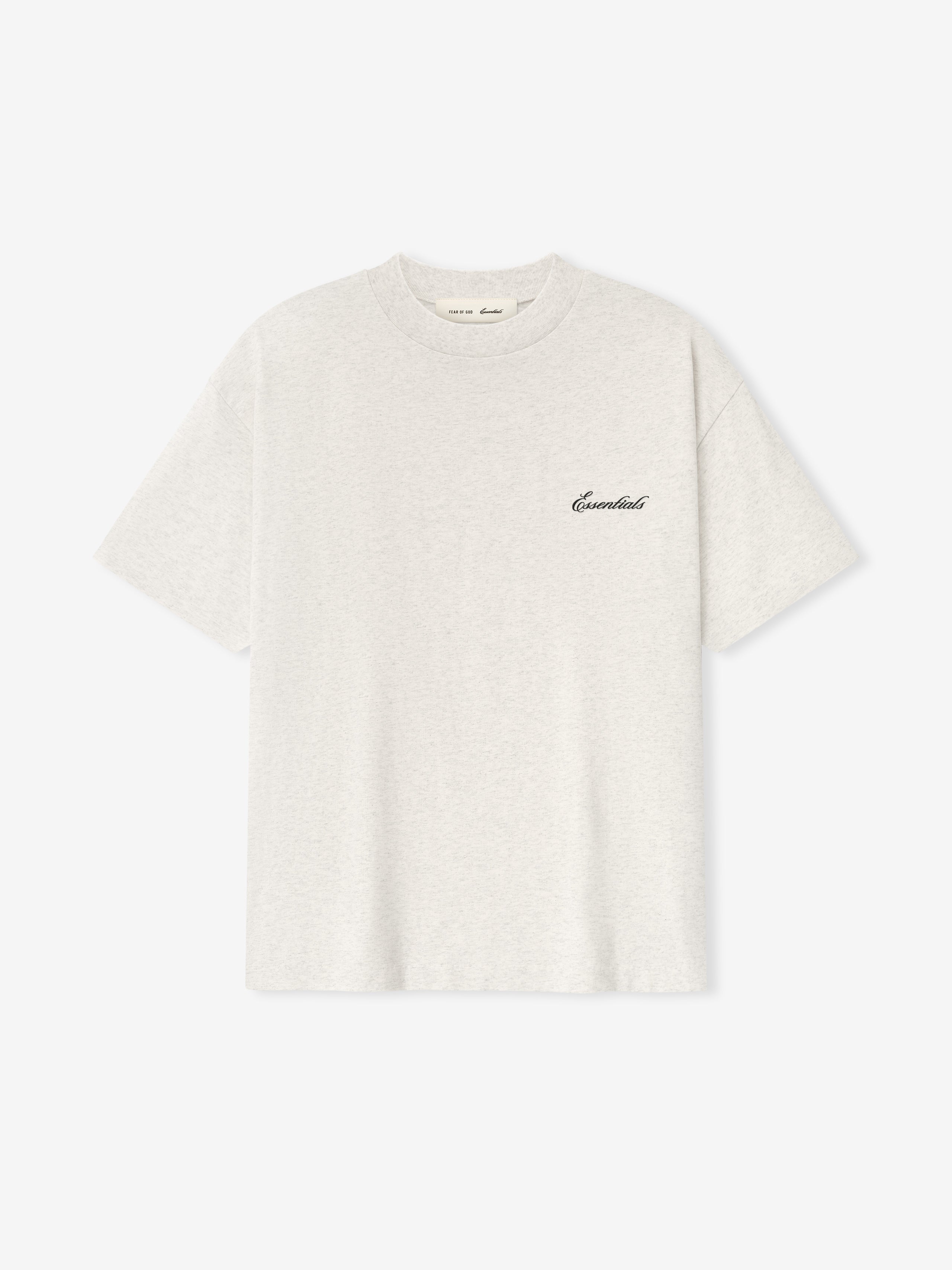 White t-shirt with essentials script logo on a white background
