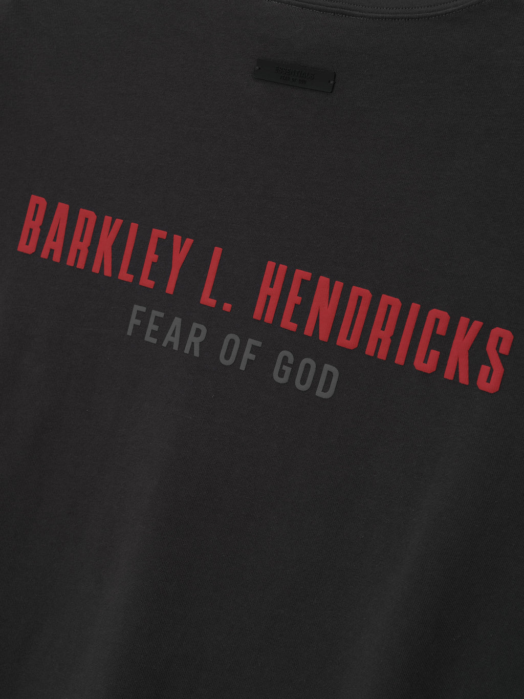 black heavy cotton jersey fabric with red Barkley L. Hendricks text and subtle gray Fear of God logo beneath