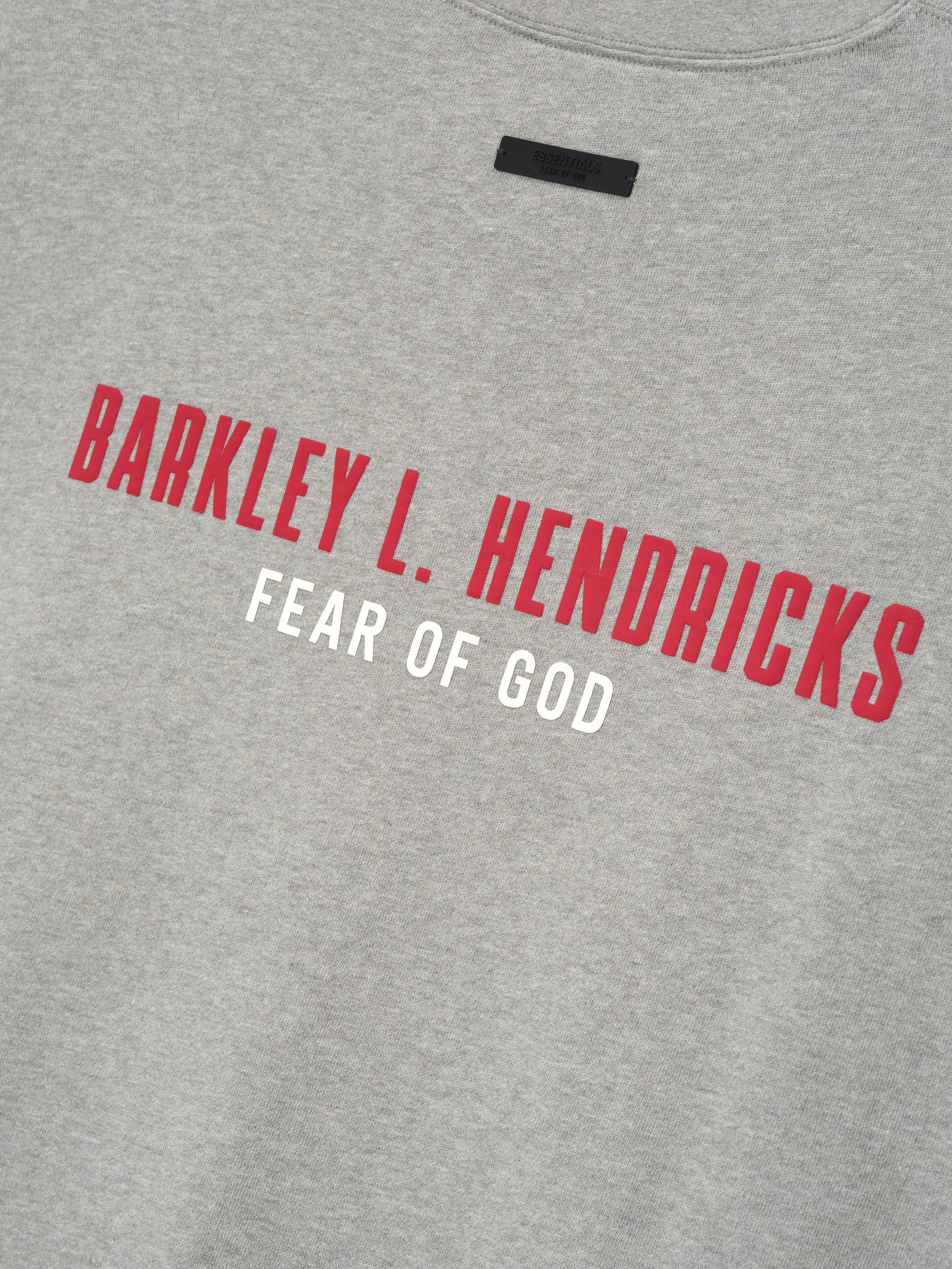 grey heavyweight cotton jersey fabric with bold red Barkley L. Hendricks text and white Fear of God lettering on chest