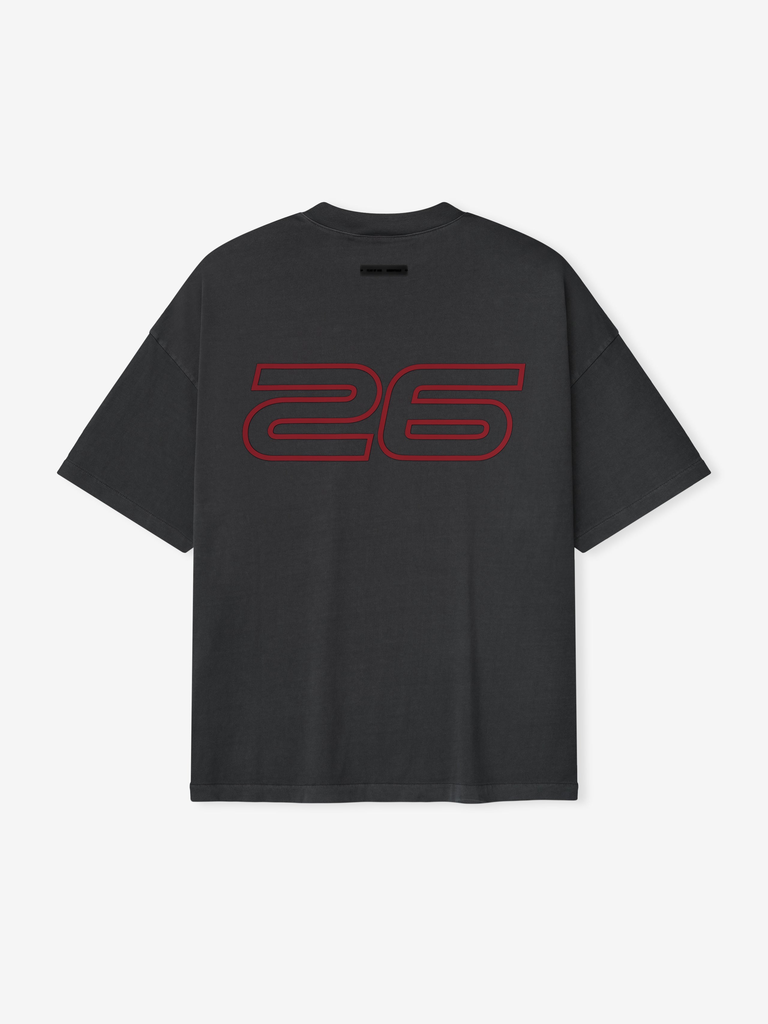 Rear view of iron grey Fear of God Essentials 90s Tee with bold red outlined 26 print on soft fabric