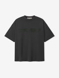 Front view of iron grey Ponte 90s Tee with dropped shoulders and subtle tonal Fear of God Essentials logo text across chest
