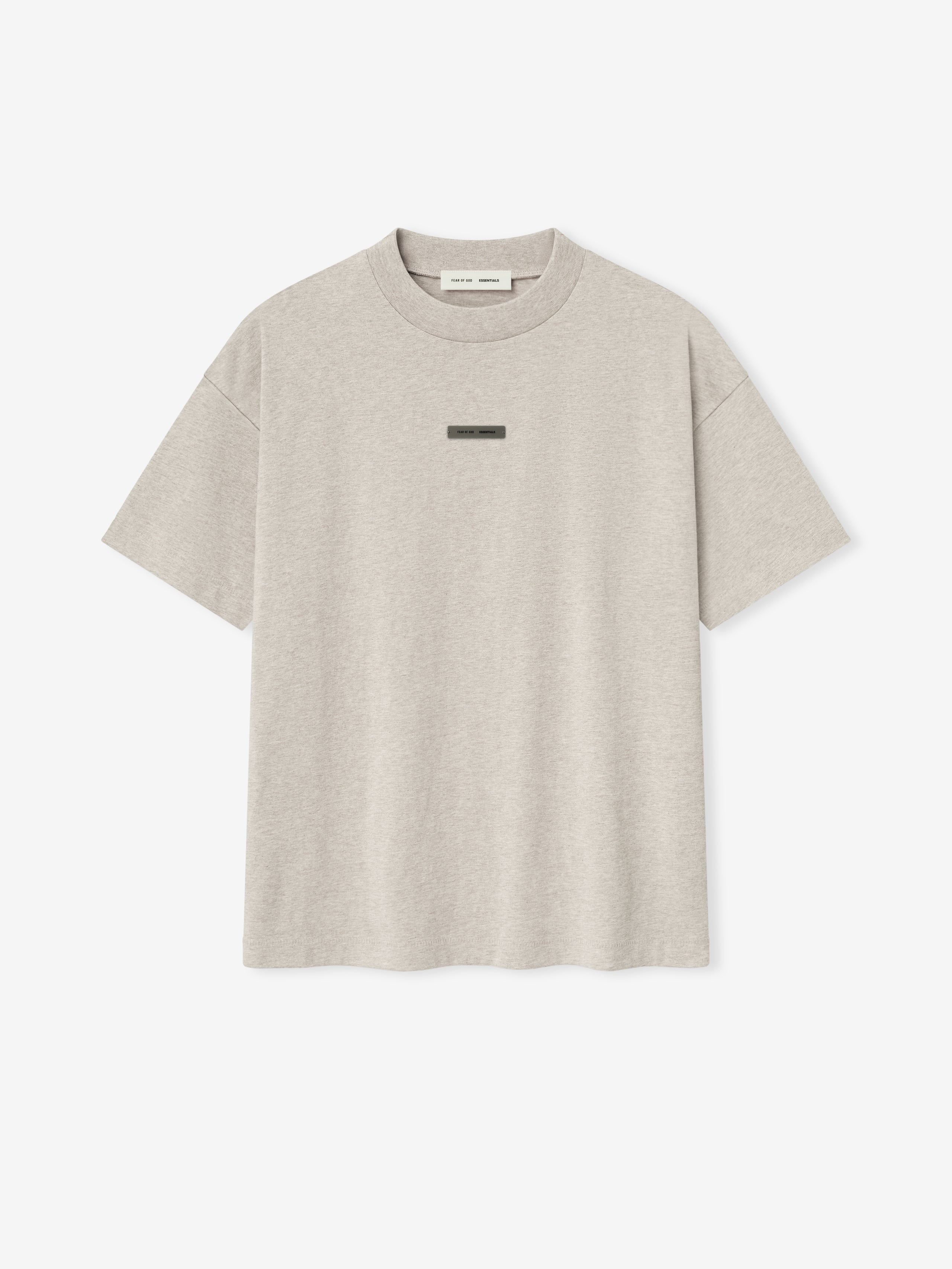 front view of light beige medium-weight cotton jersey tee with rib-knit crewneck and small rectangular logo patch on chest