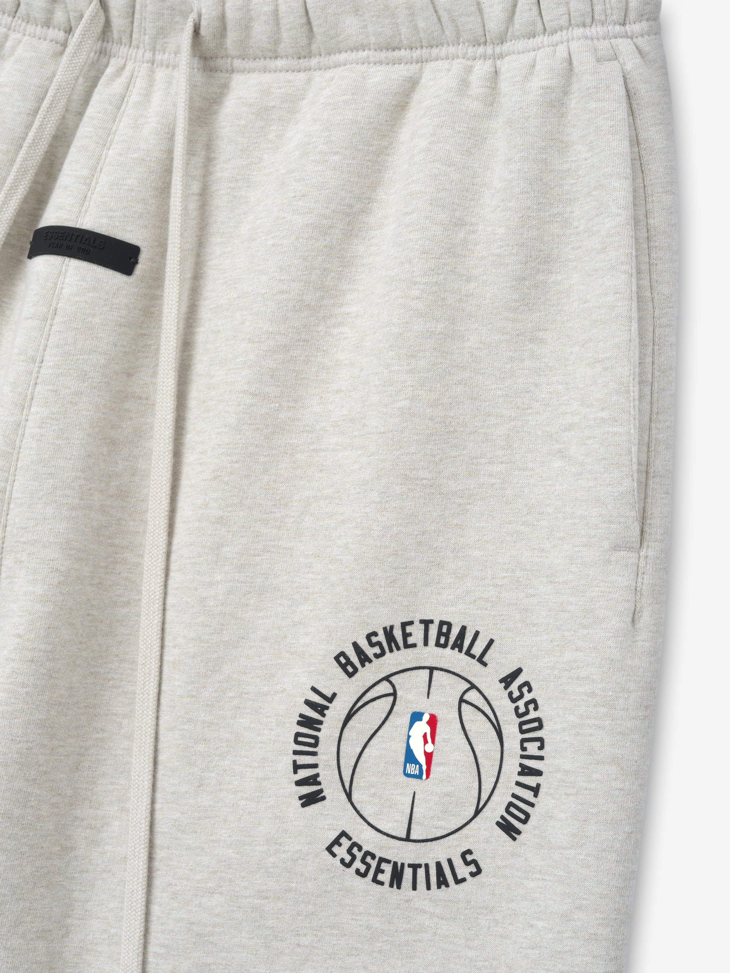 light gray heavyweight cotton fleece sweatpant with NBA logo inside basketball graphic and elastic waistband detail