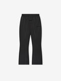 Top-down view of vintage black Womens Jersey Flare Sweatpant with elastic waistband and front drawstrings against white background