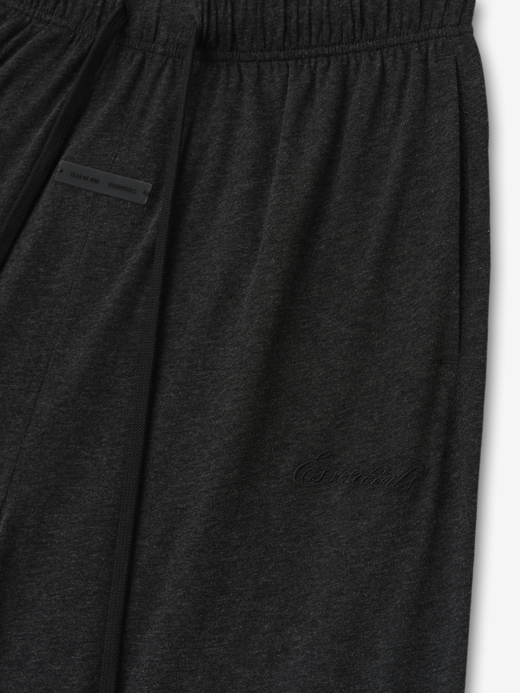 Close-up of vintage black Womens Jersey Flare Sweatpant showing elastic waistband and subtle embossed logo detail