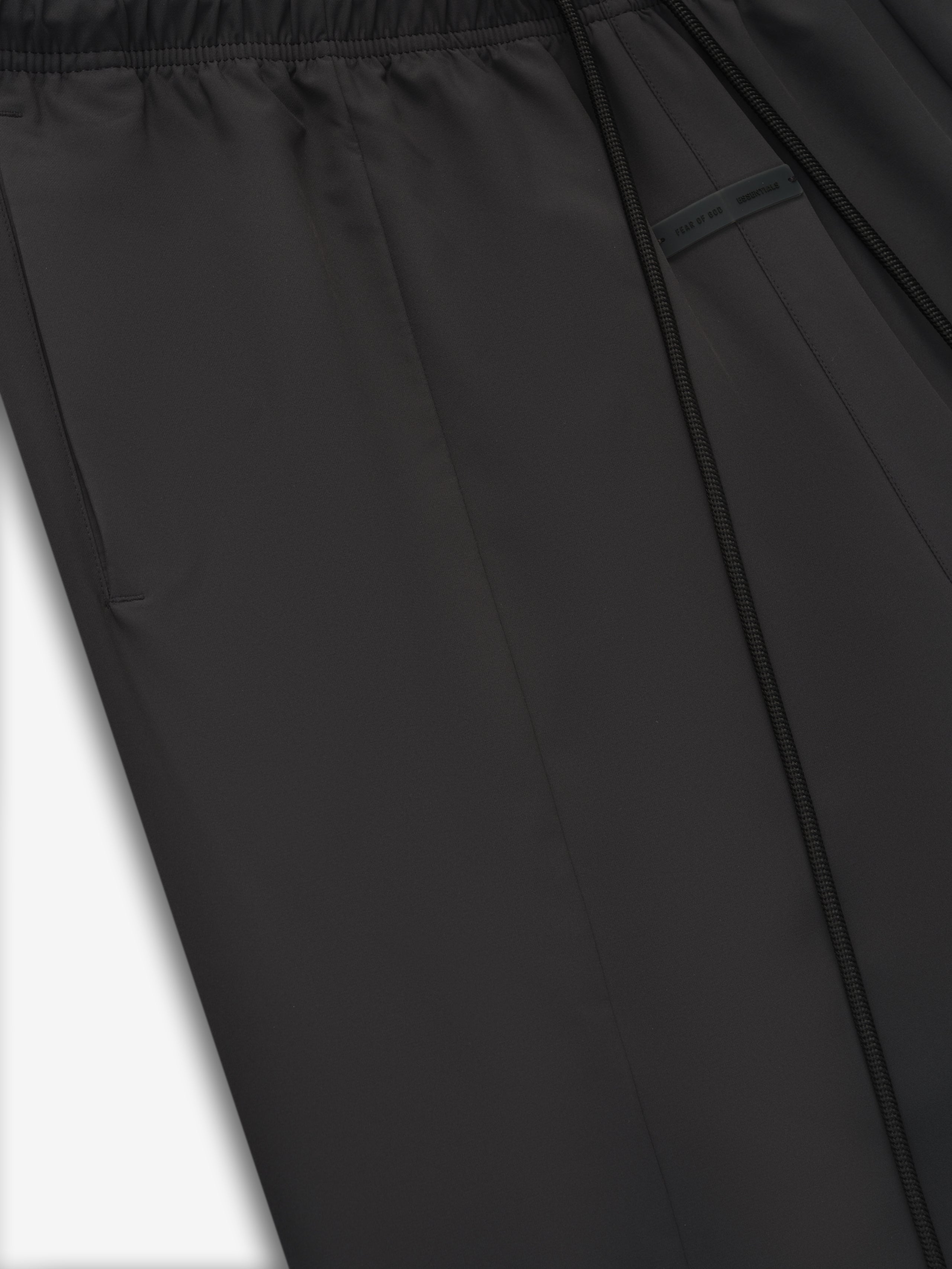 Close-up of vintage black Tech Nylon Relaxed Track Pant showing elastic waistband and side seam detail