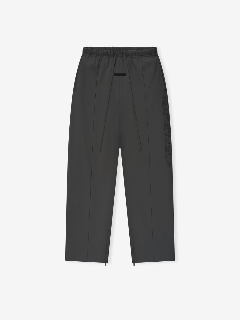 Iron grey Tech Nylon Relaxed Track Pant laid flat with visible side logo and zip details at the hem