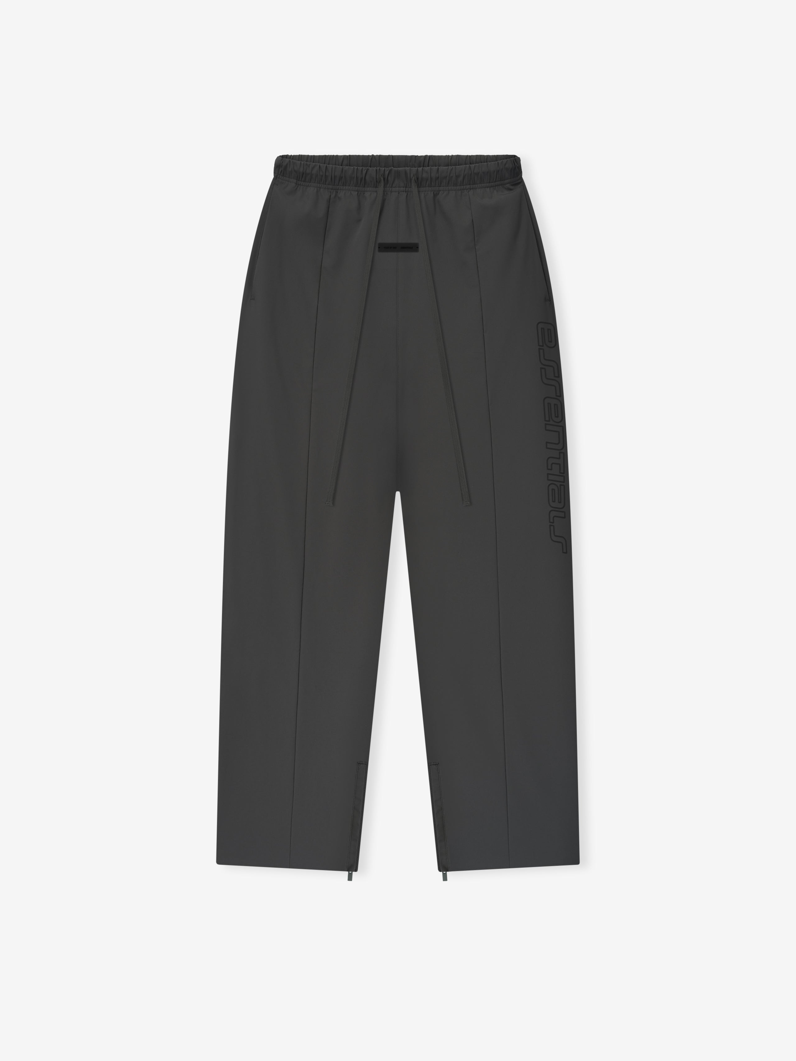 Iron grey Tech Nylon Relaxed Track Pant laid flat with visible side logo and zip details at the hem