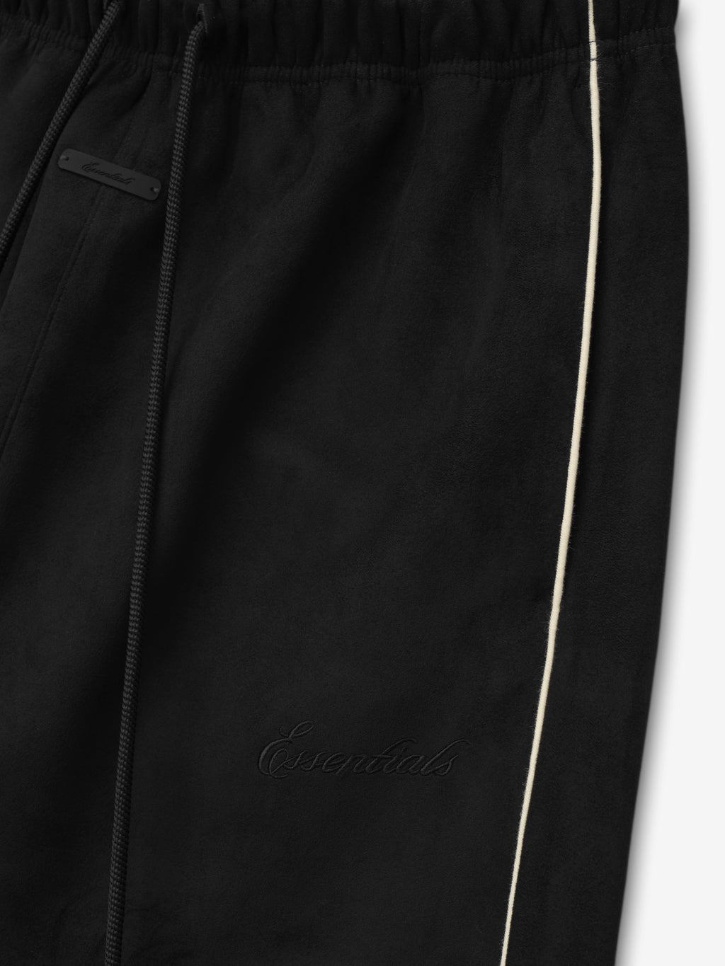 Black pants with a brand logo on a white background