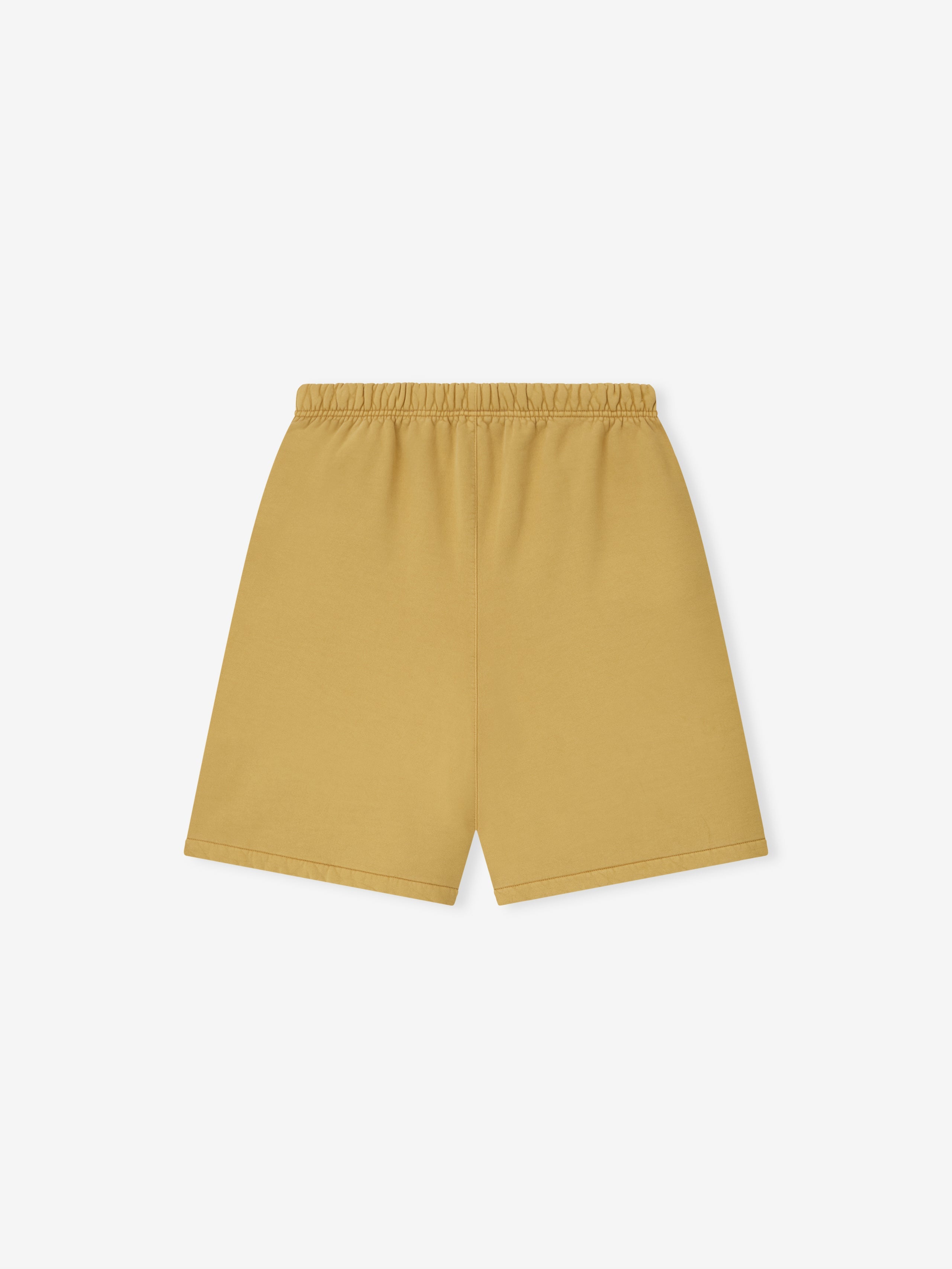 Back view of relaxed sweatshort in canyon color with elastic waistband and clean hem on white background