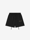 Black shorts with 'Essentials' puff print on leg on a white background