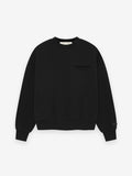 Essentials Classic Crewneck Sweatshirt -Chest Graphic in black fleece with a relaxed fit, featuring subtle monochrome chest branding and ribbed cuffs and hem for everyday wear.