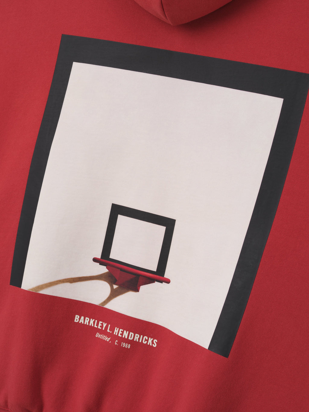 red heavyweight hoodie with framed artistic basketball hoop print and Barkley L. Hendricks text below back center
