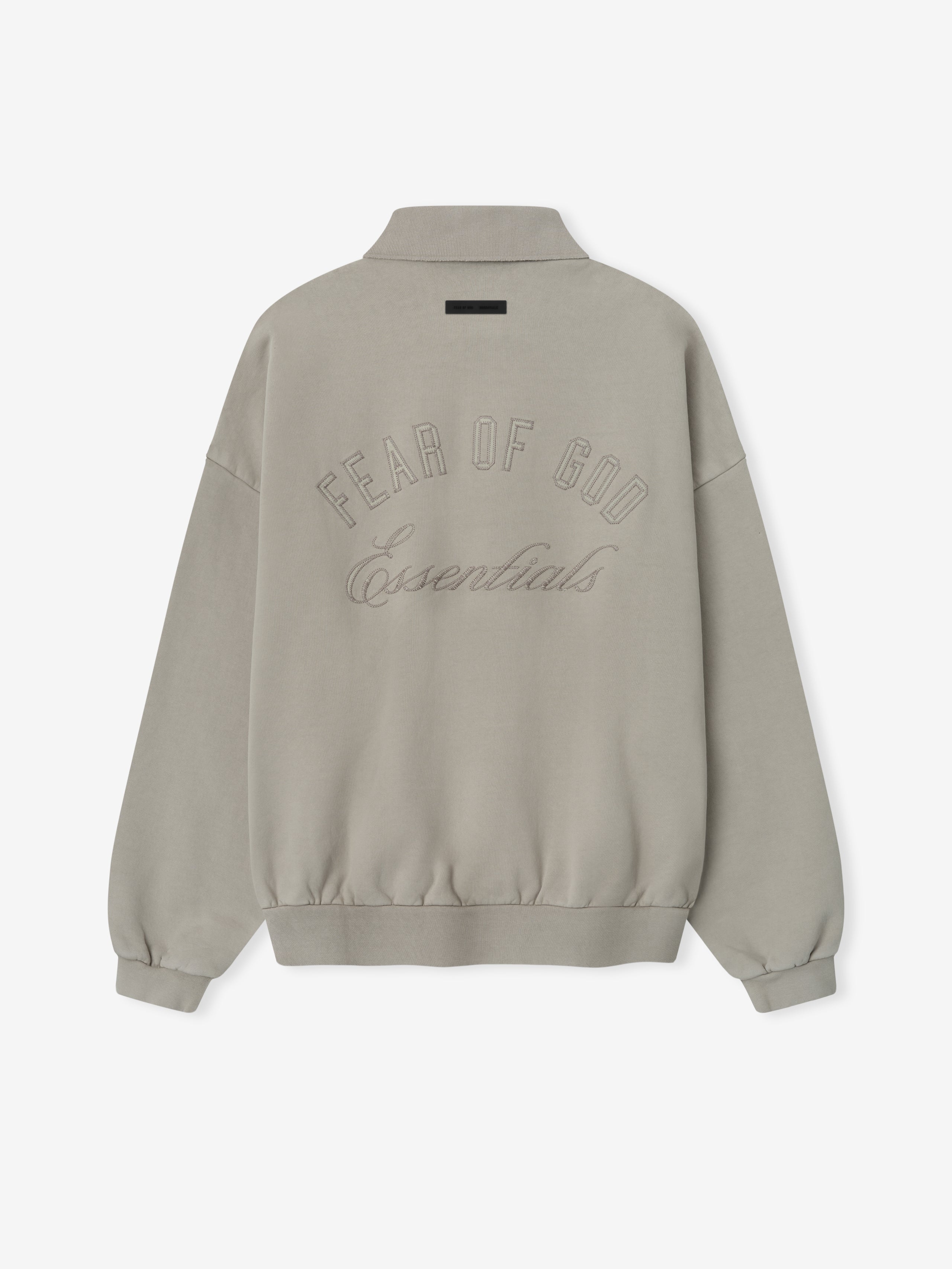 Back view of smoke grey classic polo sweatshirt with raised embroidered "Fear of God Essentials" text and ribbed hem and cuffs