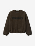 Front view of brown modern crewneck sweatshirt with black Fear of God Essentials logo and elasticated cuffs and hem