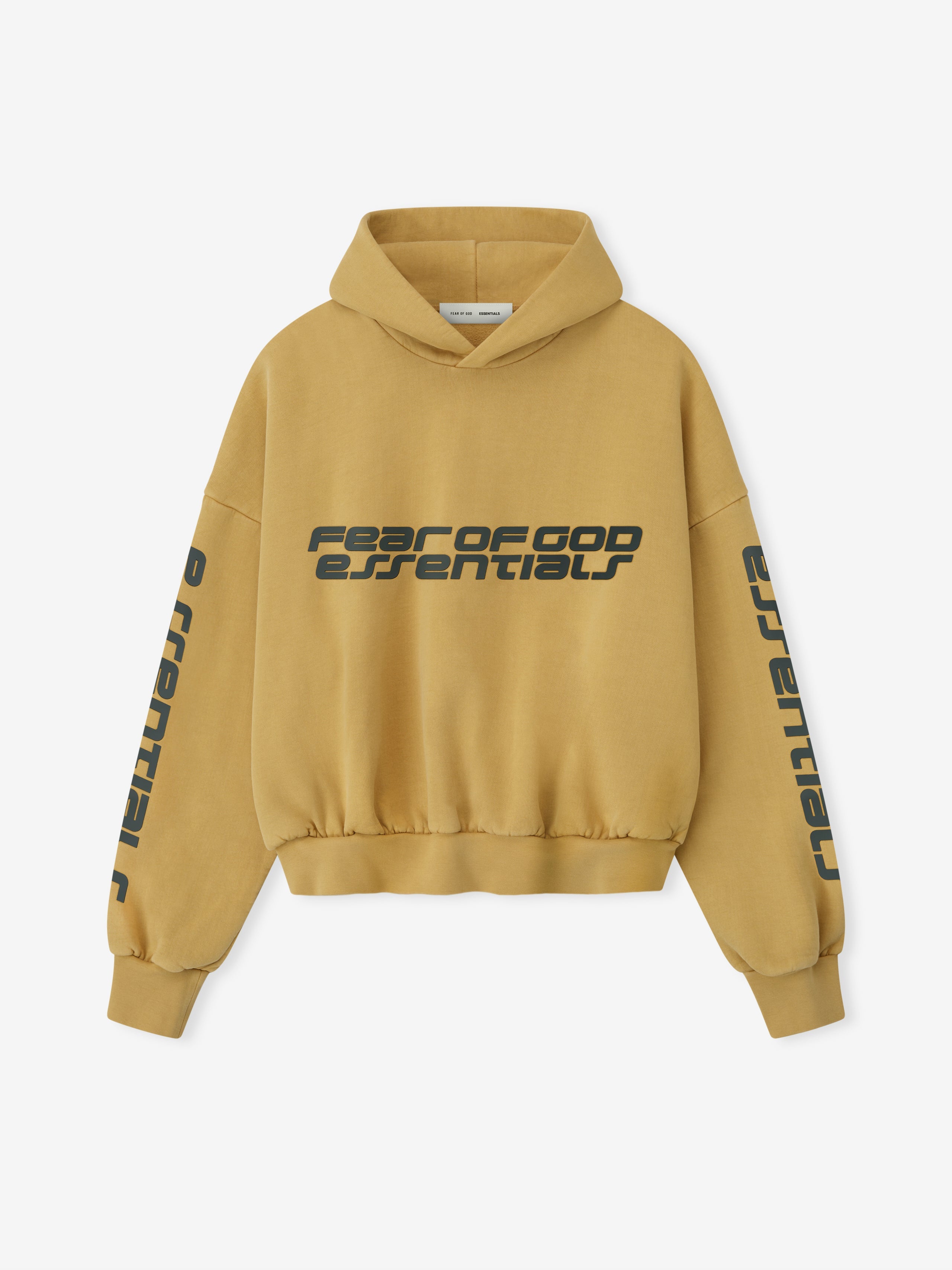 Front view of canyon-colored cropped relaxed hoodie with bold dark grey Fear of God Essentials logo on chest and sleeves