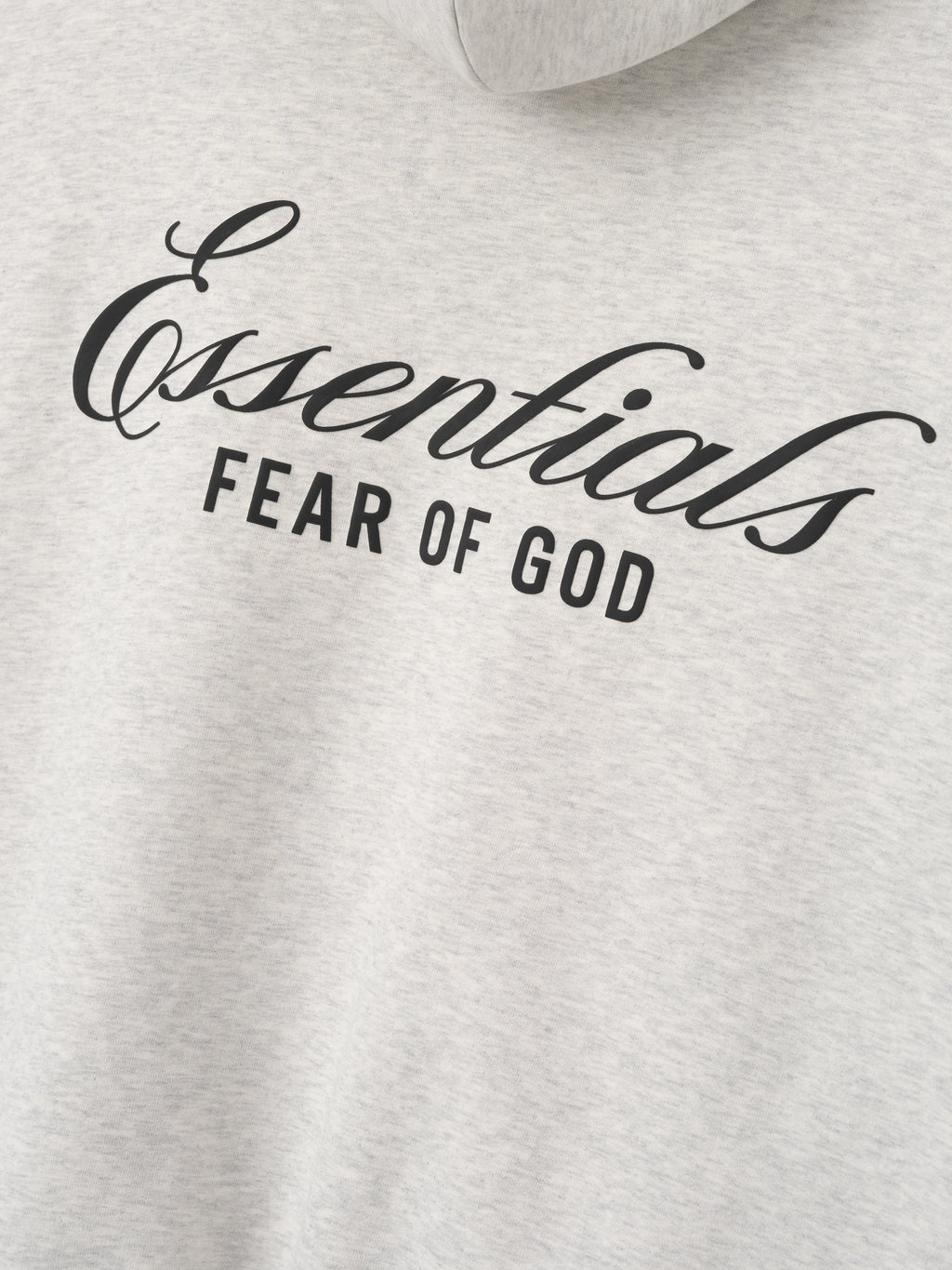 light gray heavyweight cotton fleece hoodie with black Essentials Fear of God scripted logo on chest center