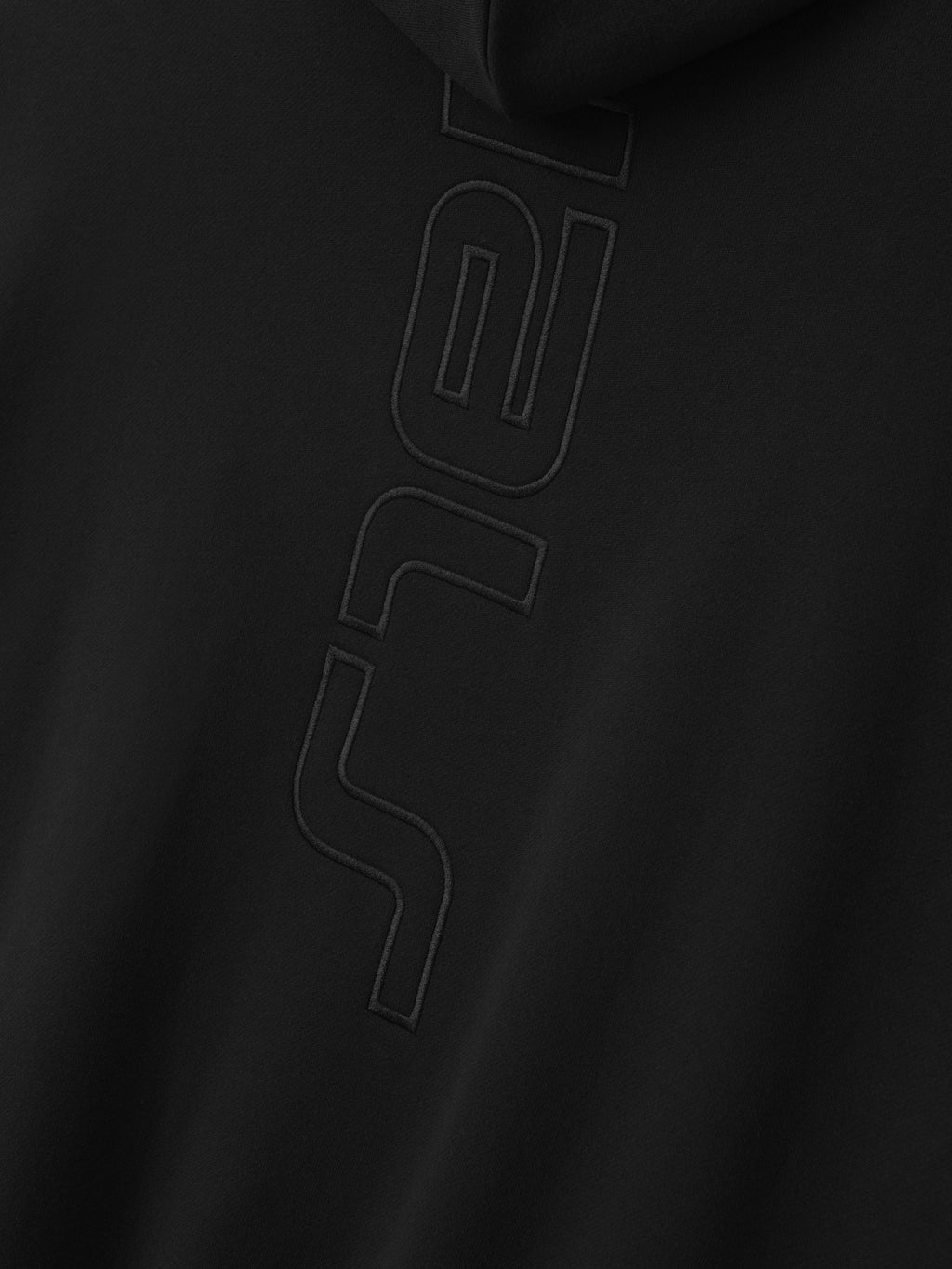 black heavyweight fleece hoodie with embossed vertical Active Trace logo on front center panel