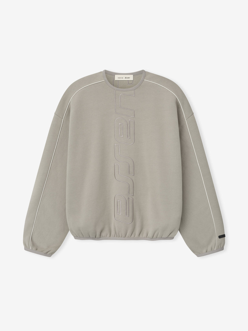 Light grey sweatshirt with vertical embossed lettering design and thin white piping along the sleeves and shoulders