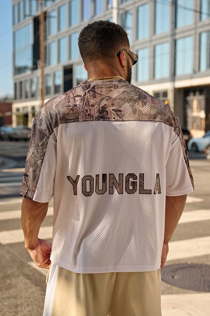 4237 - Double-Zero Jersey- Lightweight mesh jersey with retro sports design, double-zero numbers, and bold YOUNGLA branding on front and back, breathable and comfortable for all-day wear in Beige