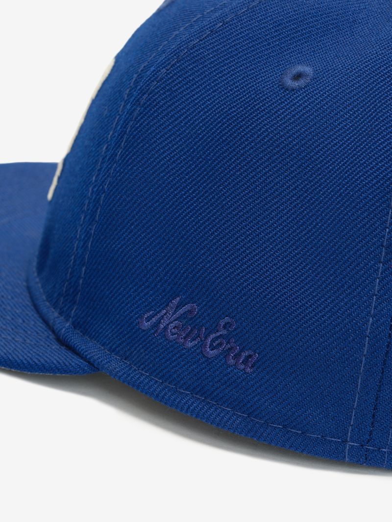 Close-up of blue Knicks 9Fifty RC Snapback showing purple New Era embroidery on side panel 4VKM89_g.jpg gallery 0