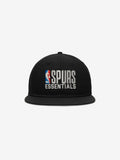 Straight-on view of black Spurs 9Fifty RC Snapback spotlighting white NBA and Spurs Essentials embroidered logos on front panel