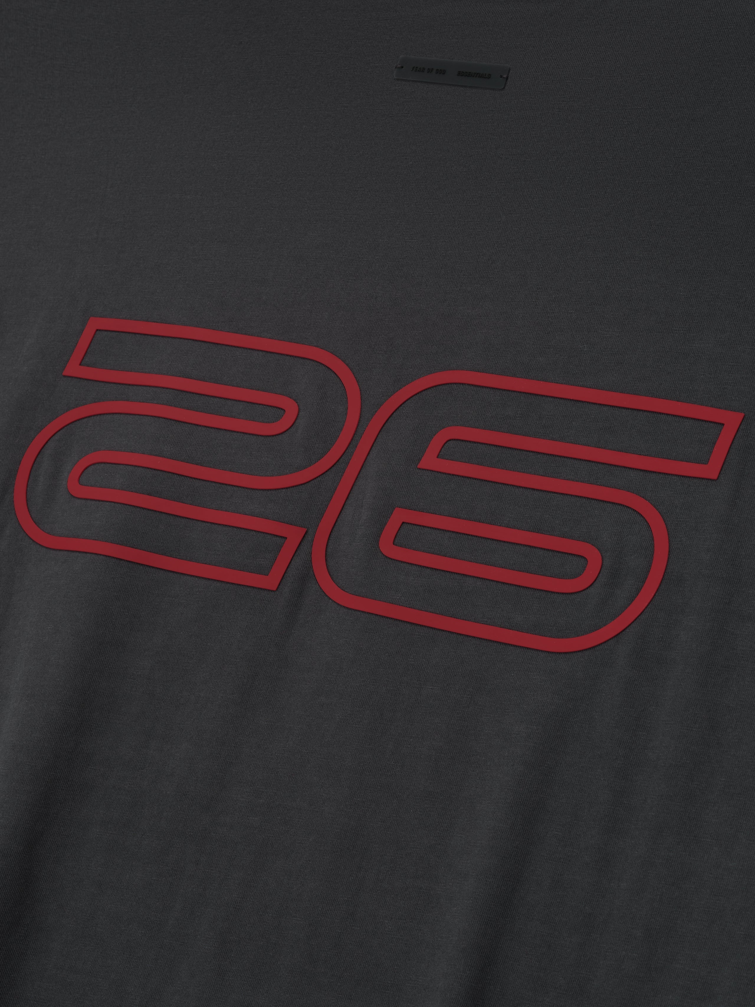 Close-up of iron grey Kids Classic Short Sleeve Tee featuring bold red outlined "26" graphic on front, gallery position 0