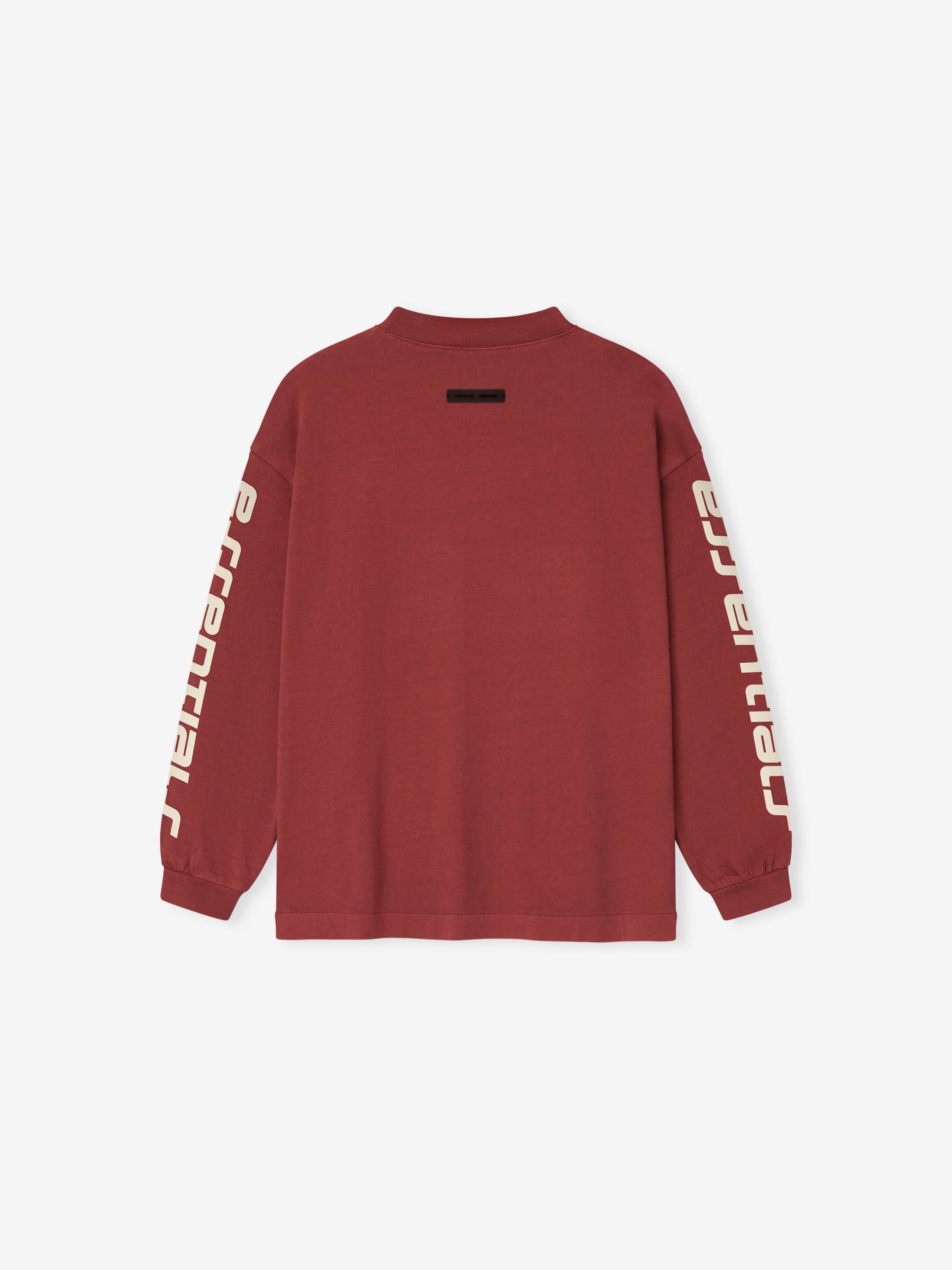 Back view of crimson Kids Classic Long Sleeve Tee with large cream Fear of God Essentials print down both sleeves, gallery position 0