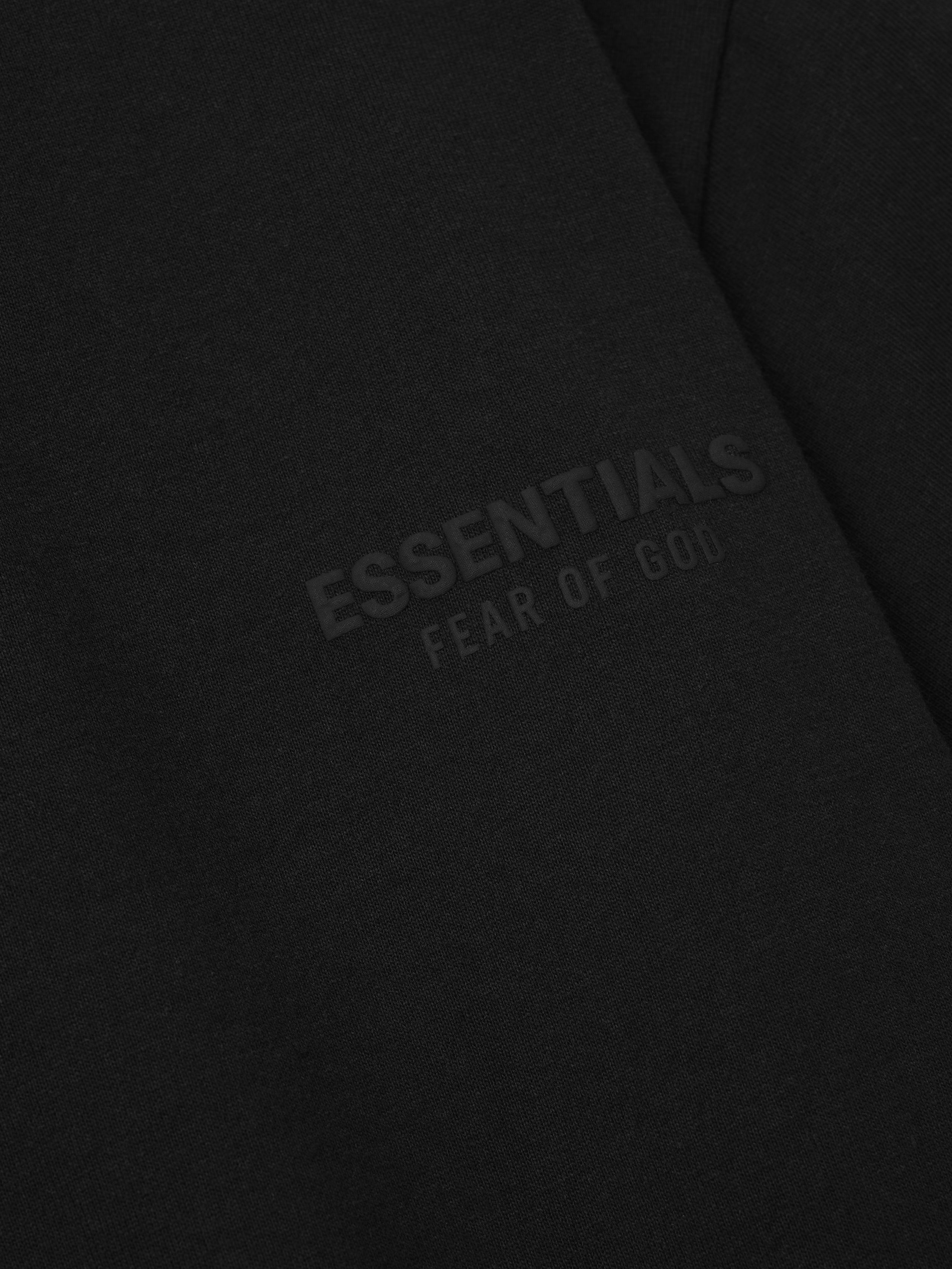 Black fabric with 'essentials Fear of God' puff print logo