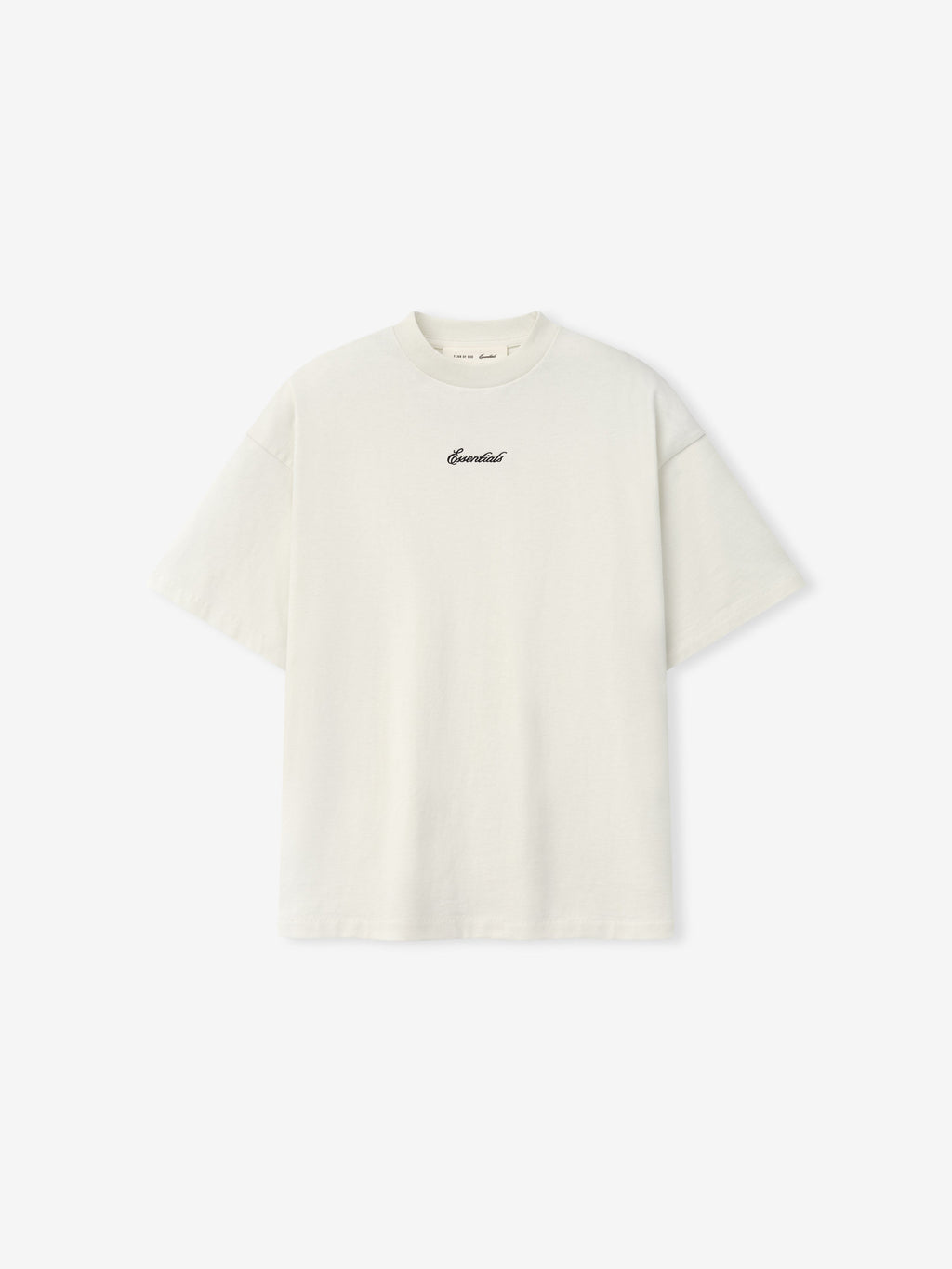 Kids Signature 90s Tee in a soft ivory fabric with a relaxed fit, featuring black cursive Essentials embroidery on the chest for a timeless casual kids' top.