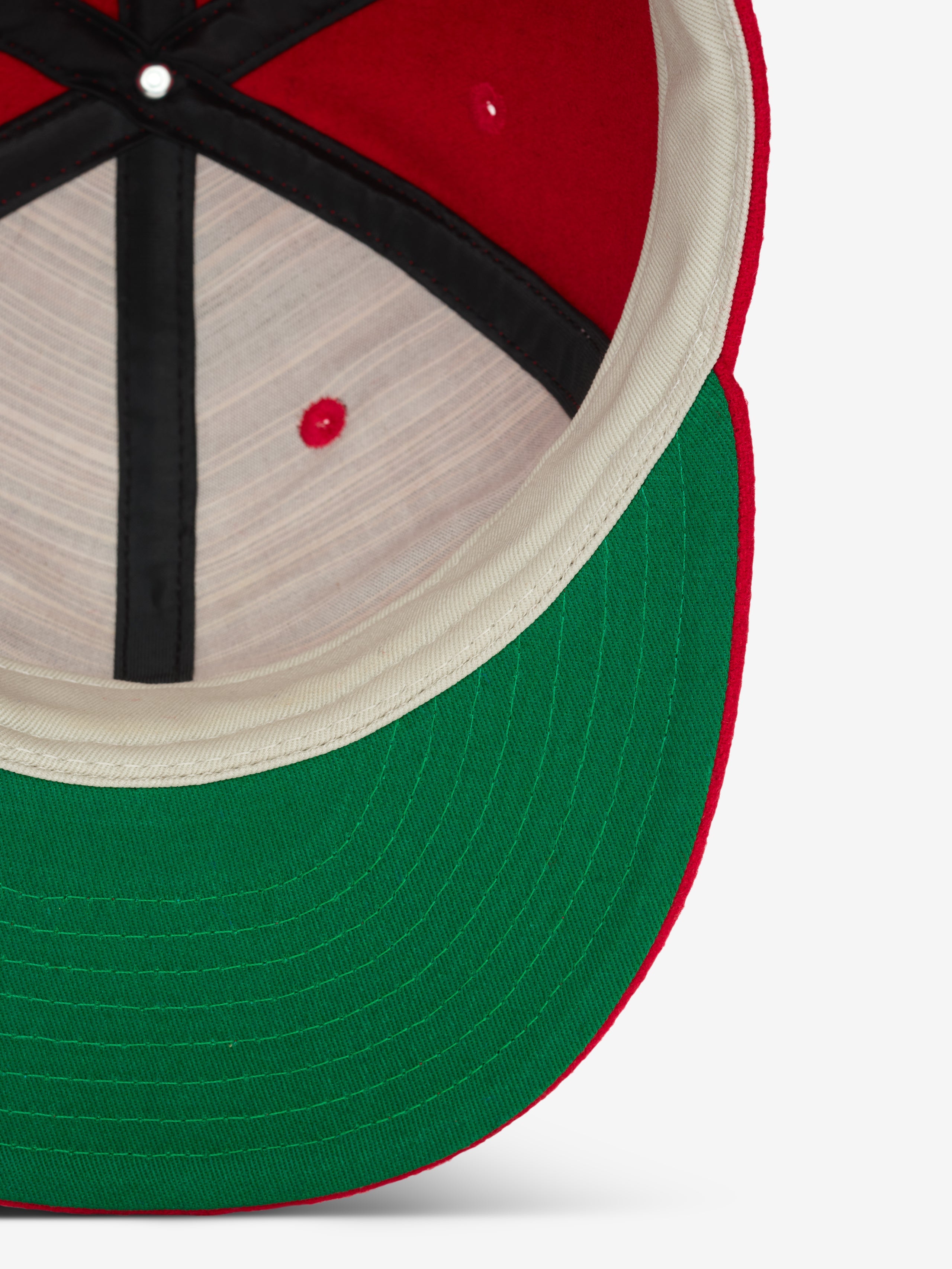 Inside view of Chicago White Sox Wool Retro Crown 59FIFTY fitted cap showing green underside of visor and interior black taping