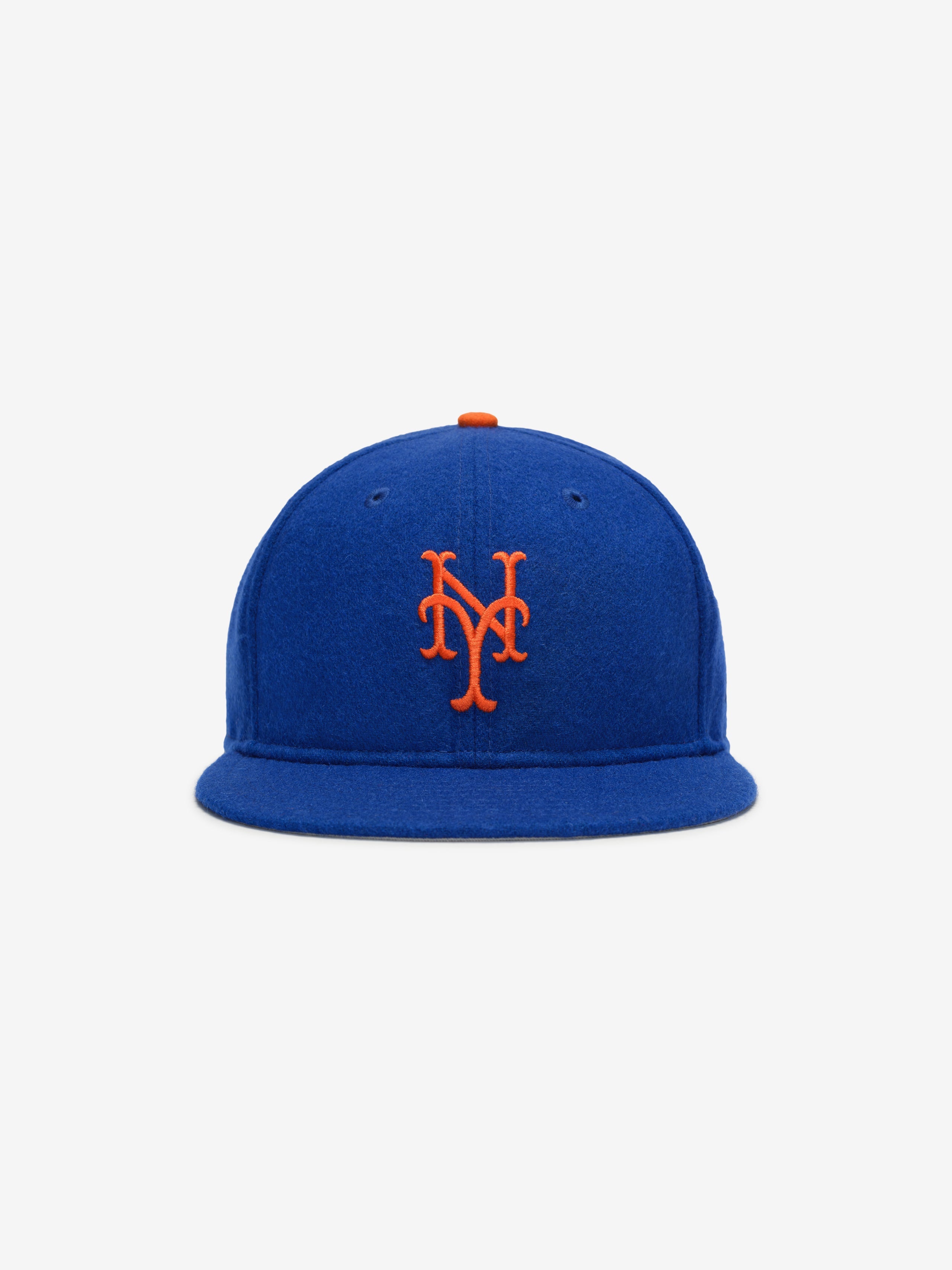 Front view of royal blue New York Mets Wool Retro Crown 59FIFTY fitted cap with bright orange NY logo and button on top