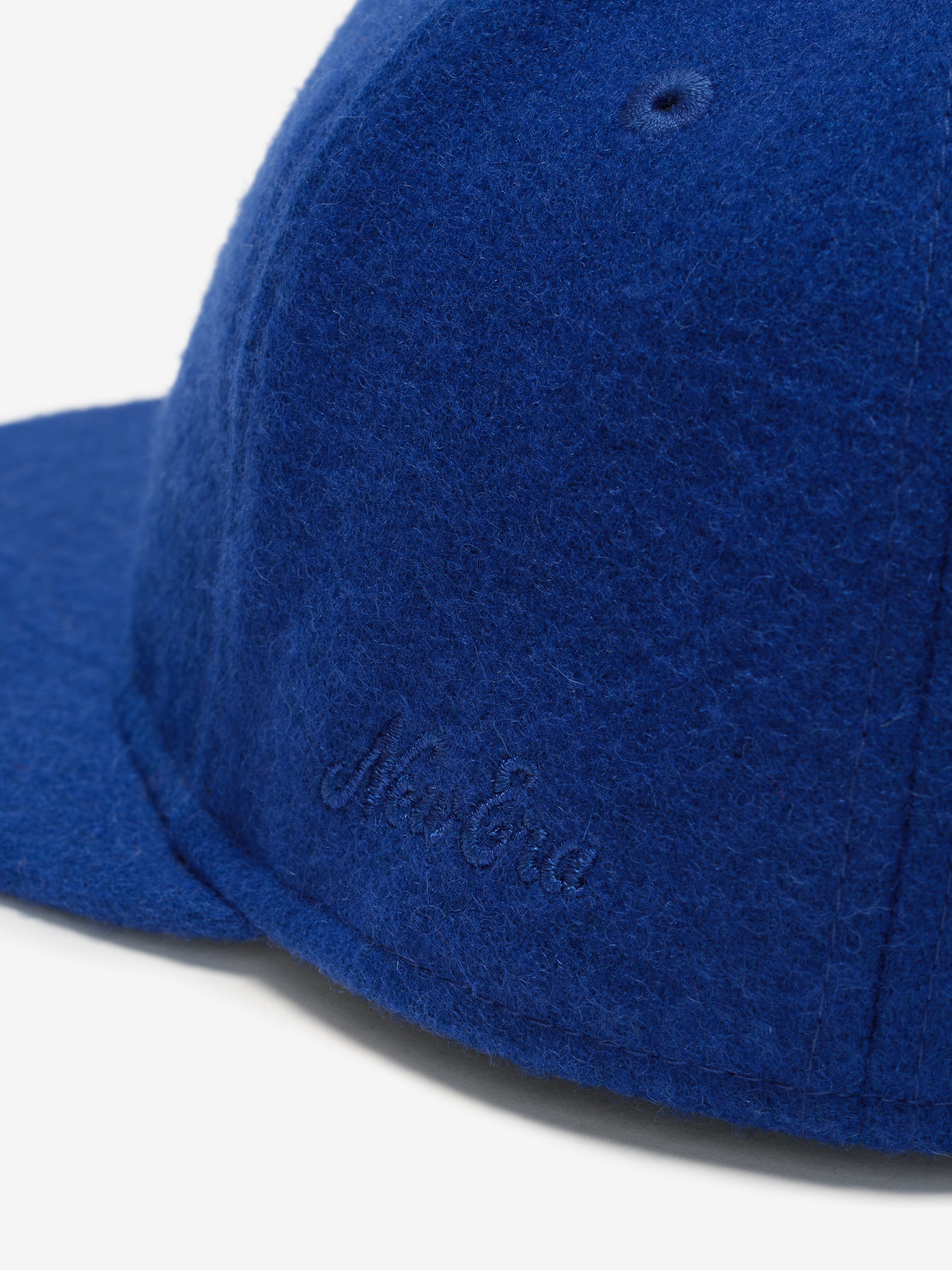 Close-up side view of royal blue New York Mets Wool Retro Crown 59FIFTY fitted cap with tonal New Era embroidery, gallery image 0