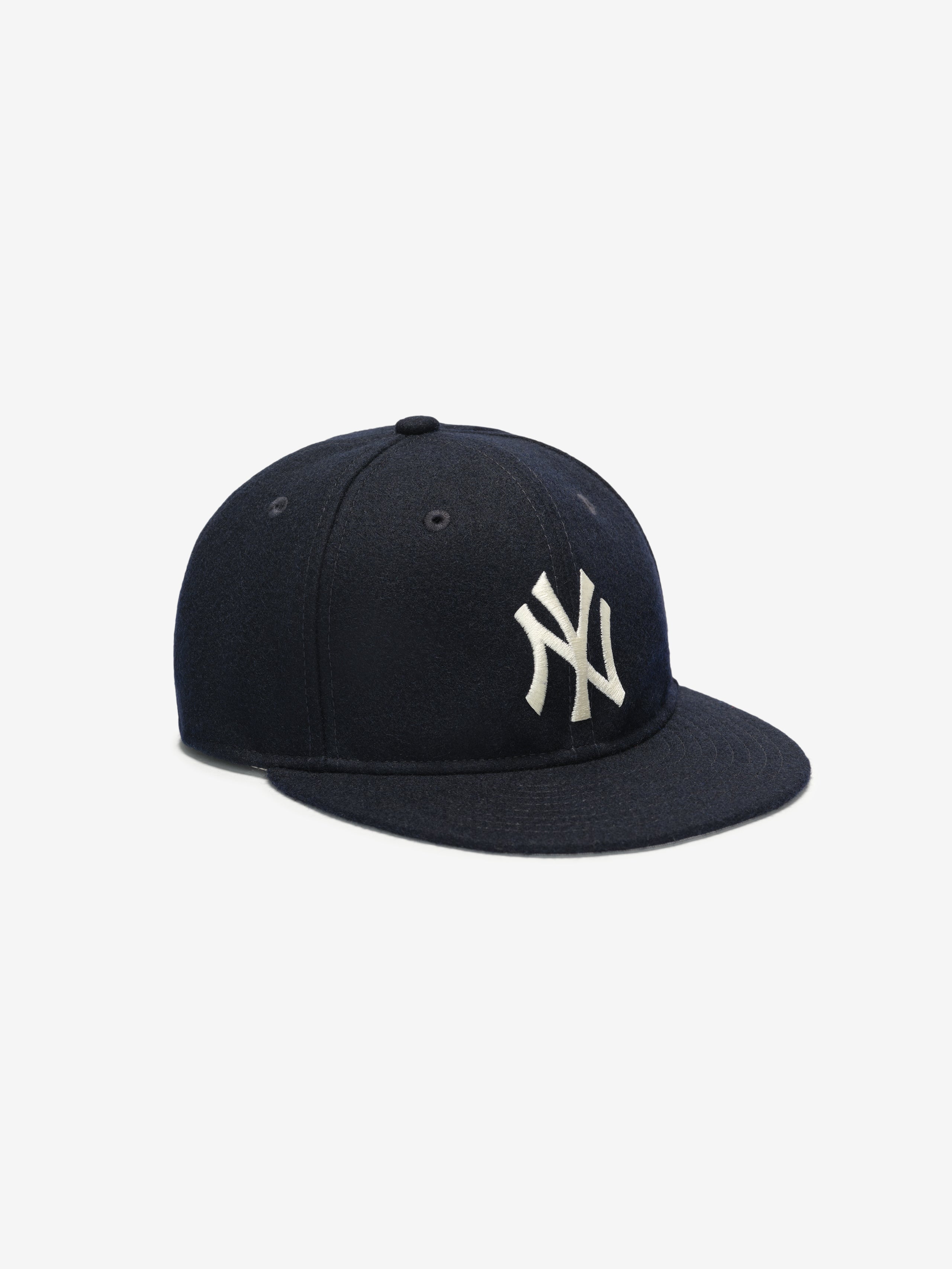 Angled view of navy New York Yankees Wool Retro Crown 59FIFTY fitted cap with white NY logo, gallery image 0 FOG_5950_RC_31585_NEYYAN-NVY_2.jpg