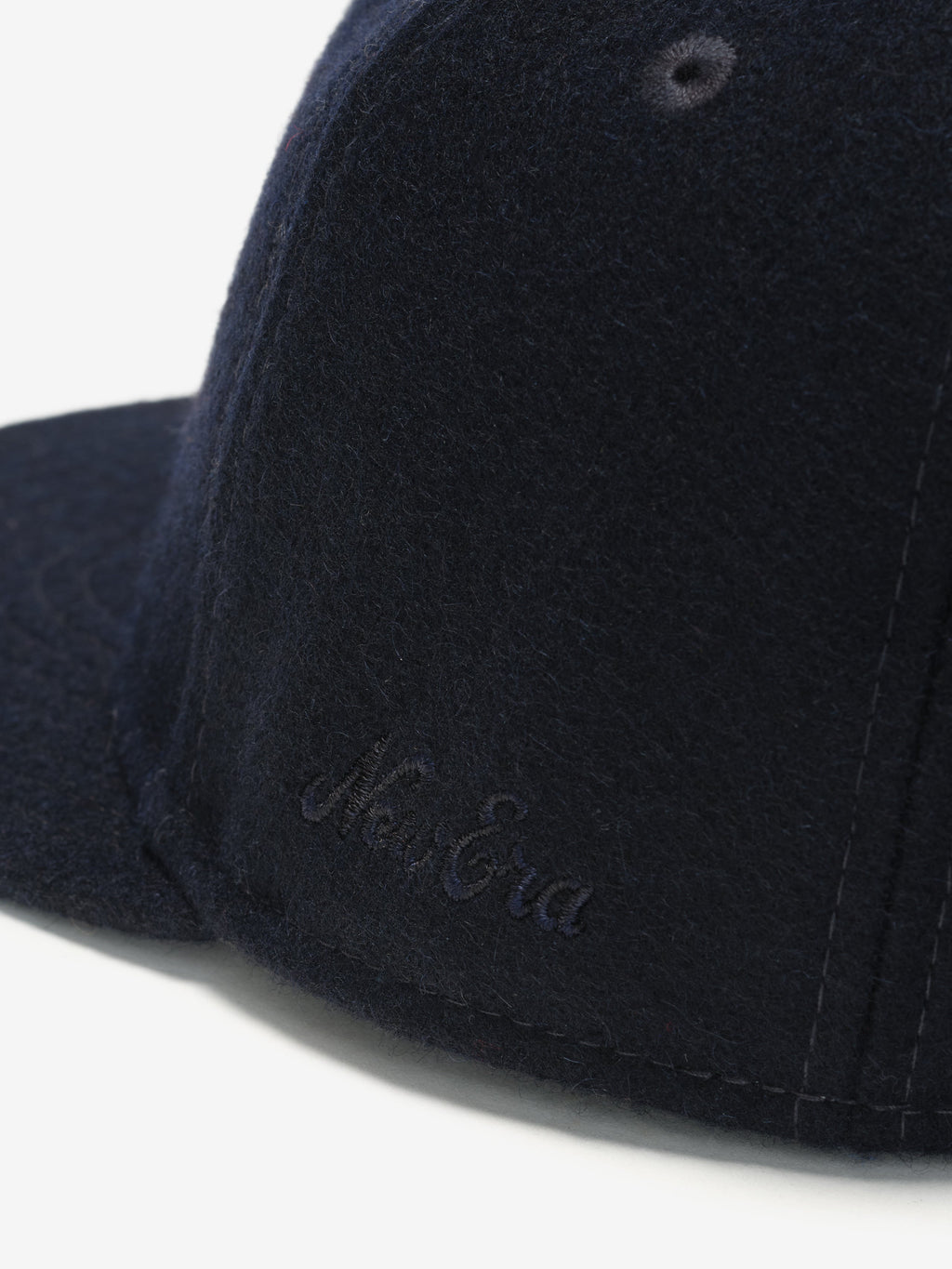 Close-up of navy New York Yankees Wool Retro Crown 59FIFTY fitted cap with tonal New Era script embroidery, gallery image 0
