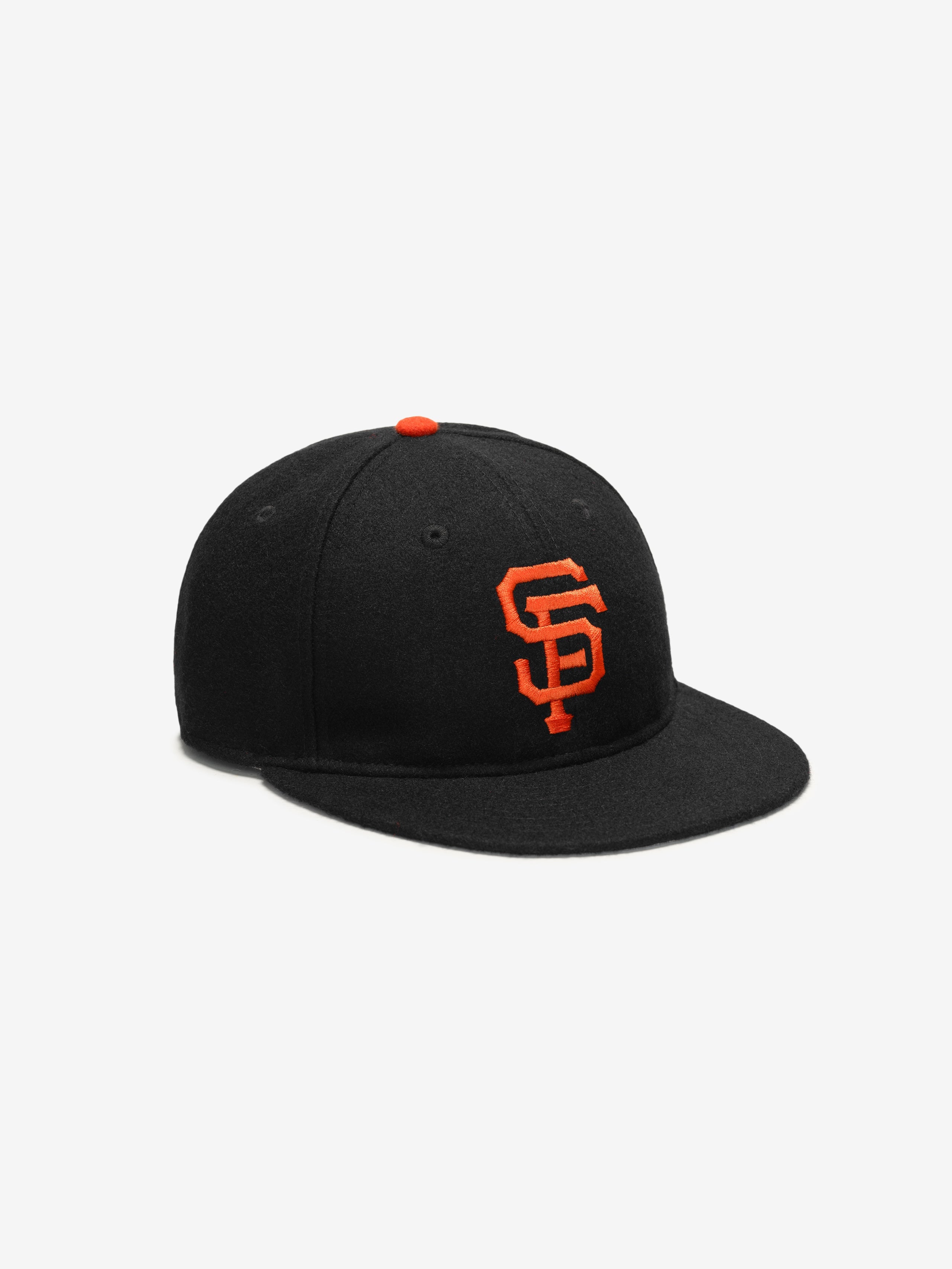 Angled front view of black San Francisco Wool Retro Crown 59FIFTY fitted cap with orange SF logo and button, gallery image 0
