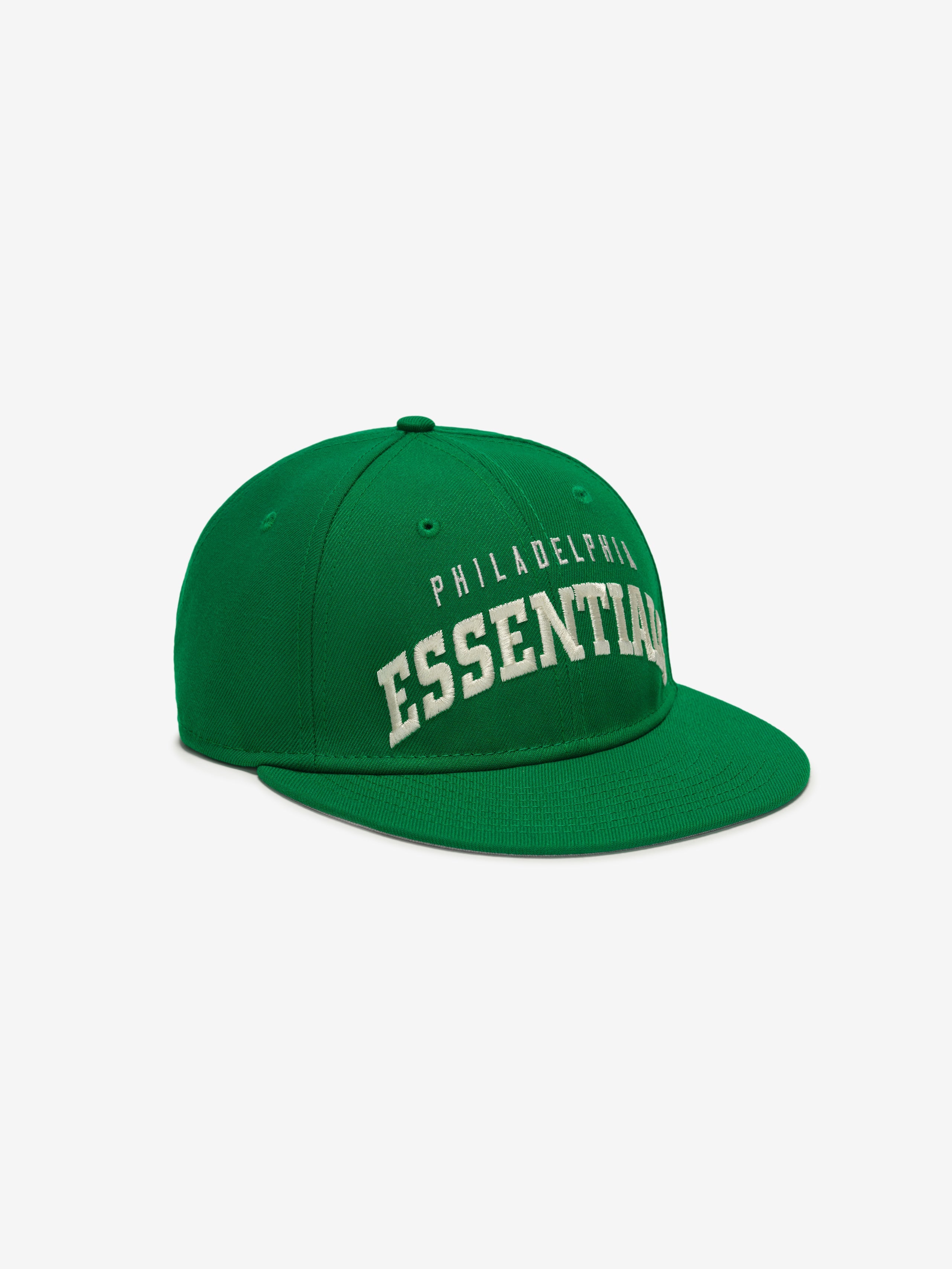 Angled front view of green Eagles 9Fifty RC Snapback with white Philadelphia Essentials embroidery, gallery image 0
