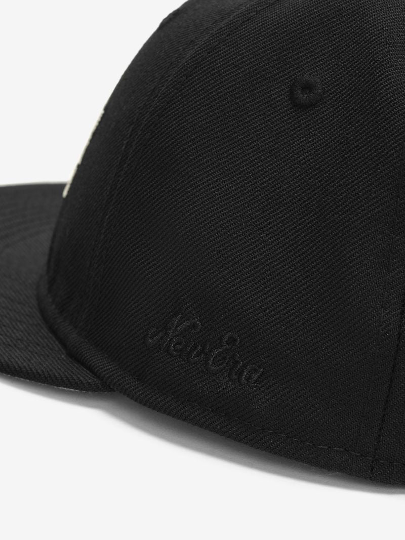Close-up of black WNBA 9Fifty RC Snapback showing subtle embroidered New Era logo on side panel GXj-NxDg.jpg gallery 0