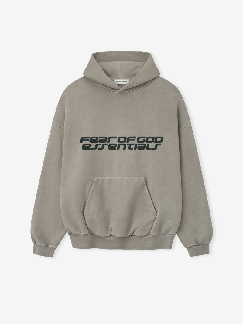 Front view of muted taupe Heavy Fleece 90s Hoodie with bold Fear of God Essentials logo and kangaroo pocket Qpb71Wag.jpg gallery 0