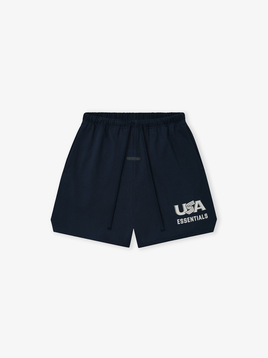 Flat lay of navy blue shorts with elastic waistband, drawstring, and white "USA ESSENTIALS" graphic on front left leg