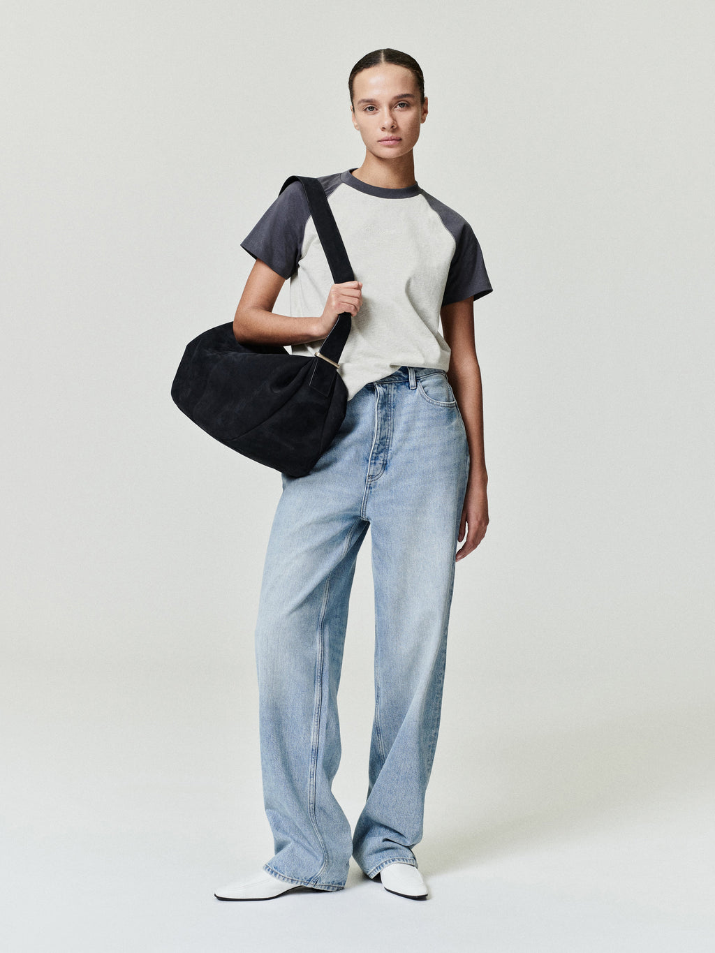 woman wearing vintage wash 100% cotton denim jeans with relaxed straight leg and low rise fit