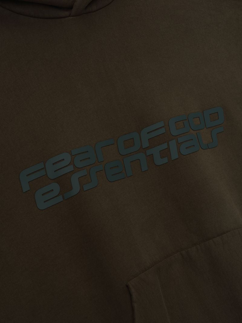Close-up of brown Heavy Fleece 90s Hoodie showing diagonal Fear of God Essentials logo above front pocket Z7PsrRNA.jpg