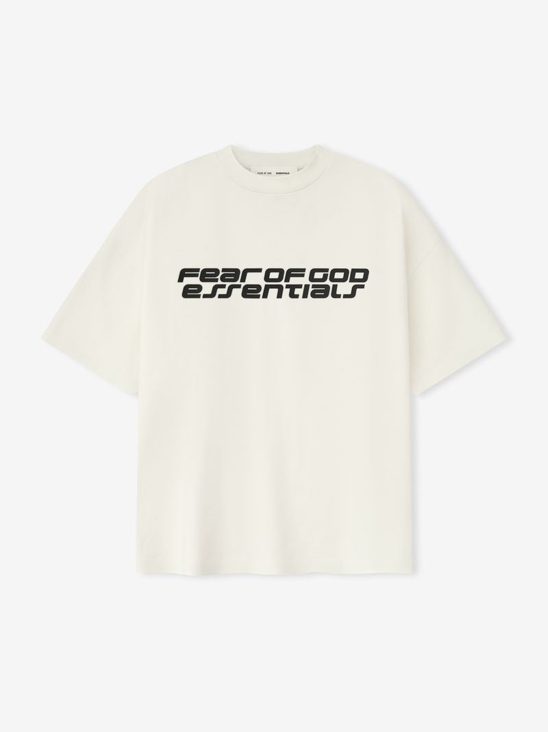 Front view of off-white Ponte 90s Tee displaying bold black Fear of God Essentials text centered, gallery file ZkAmBwHA.jpg