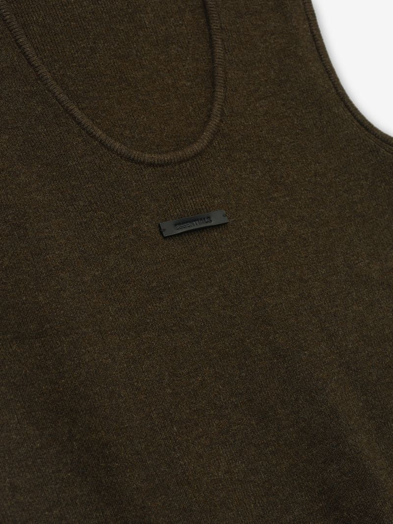 Close-up of a dark olive ribbed tank top with a small black rectangular logo tag on the chest area