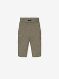olive green women's waffle knit biker shorts with stretch fabric and high elastic waistband laid flat on white background