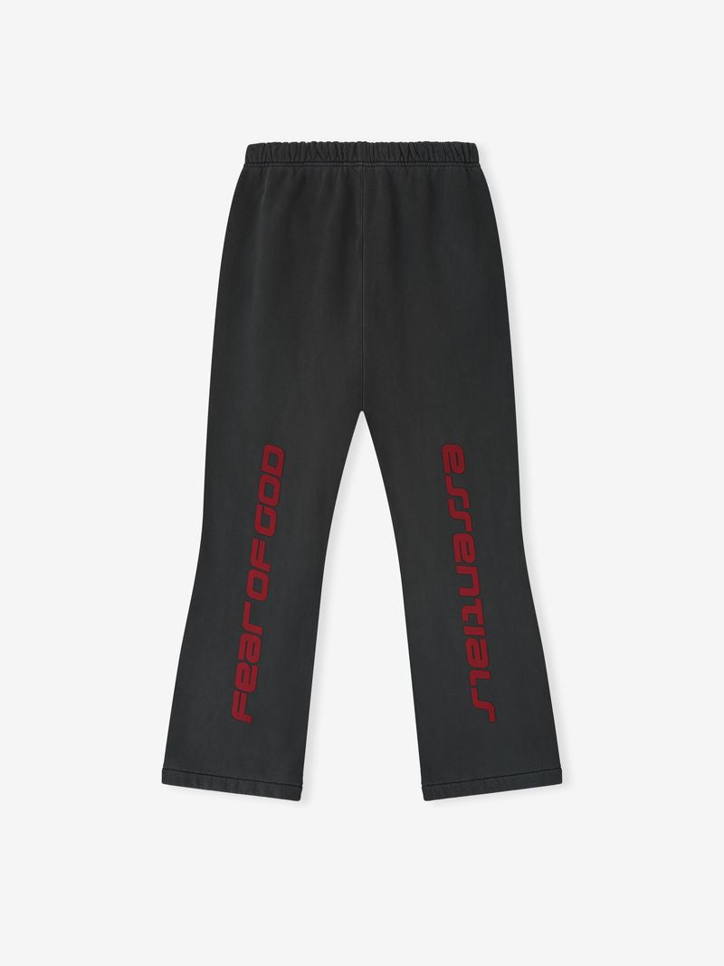 Black Heavy Fleece Flare Sweatpant laid flat showing back with red FearofGod vertical lettering, file hljWxZGw.jpg gallery 0