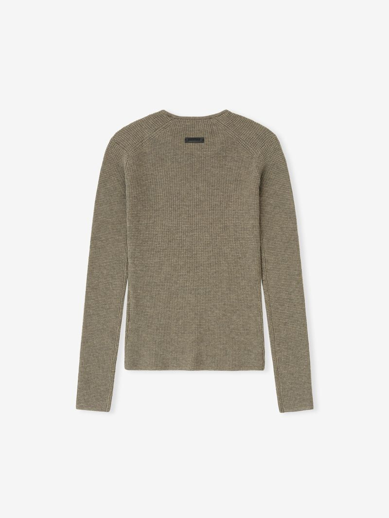 back view of olive green women's waffle knit long sleeve top with fitted shape and crew neckline