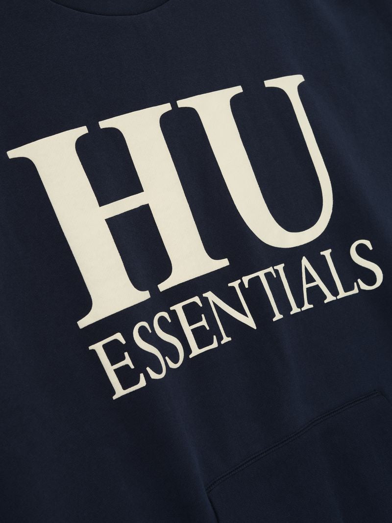 Close-up of navy Howard University Sport Crewneck showing large cream HU Essentials text and soft cotton fabric, file n_KqNTkw.jpg